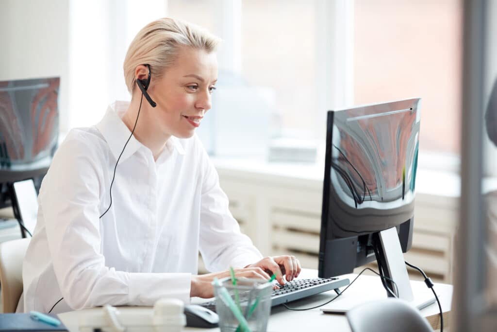 Female Operator in Call Center Office